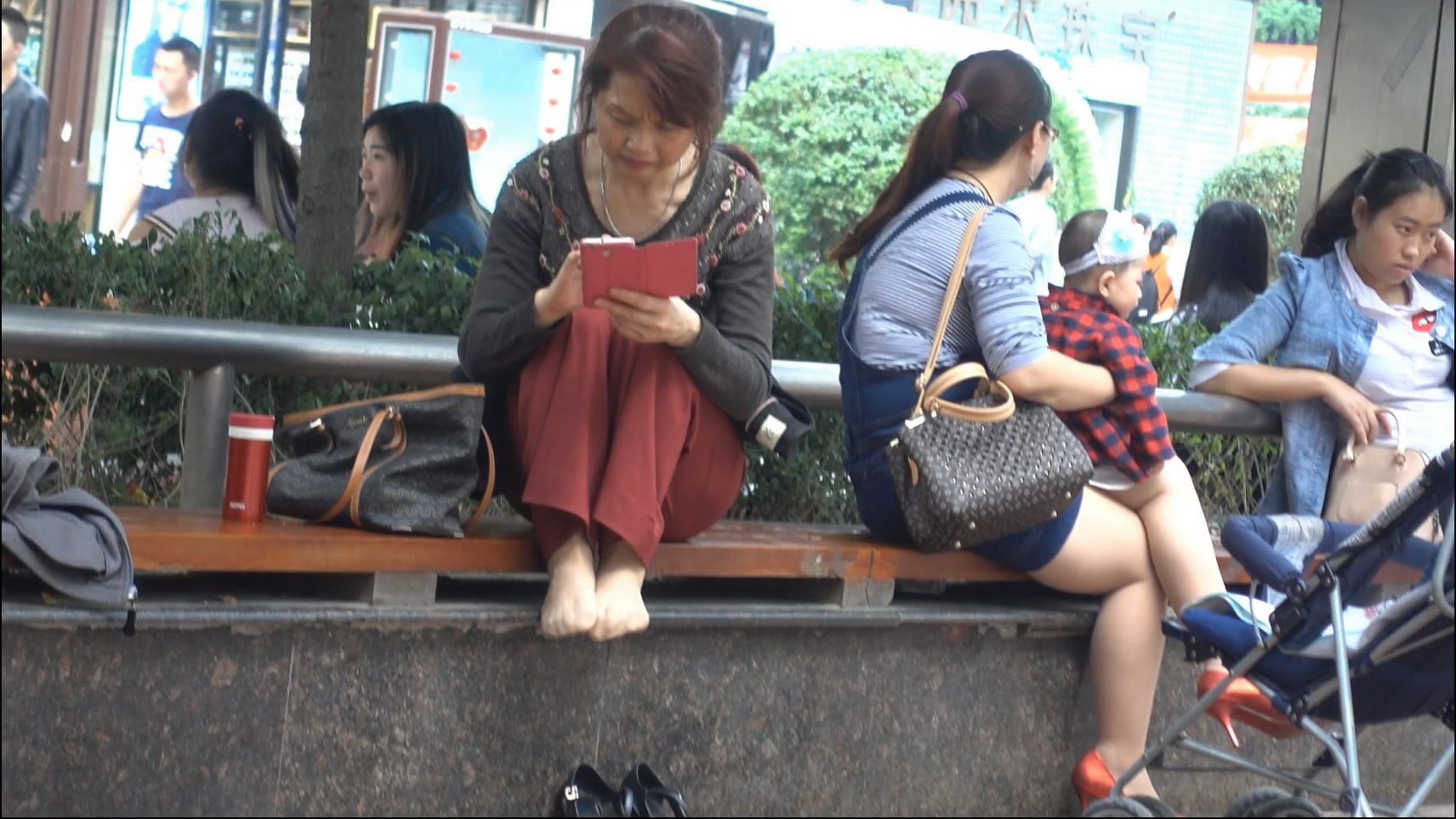 Serious woman with phone